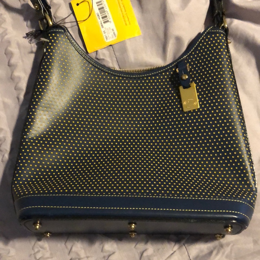 Dooney and Bourke hobo bag. Blue with tan dots